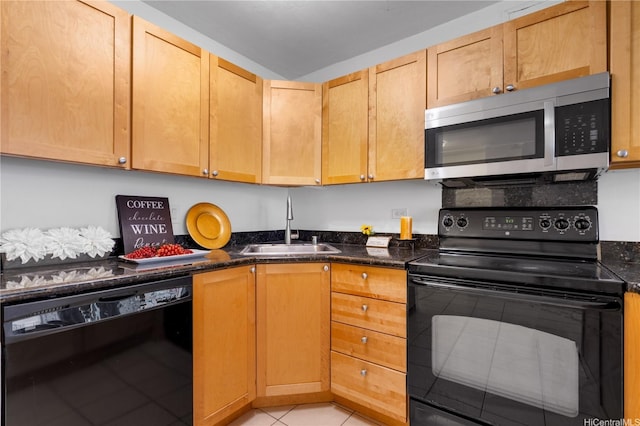 430 Kaiolu St Unit 505, Honolulu, HI 96815 - kitchen featuring black appliances, light tile patterned flooring, and dark stone countertops