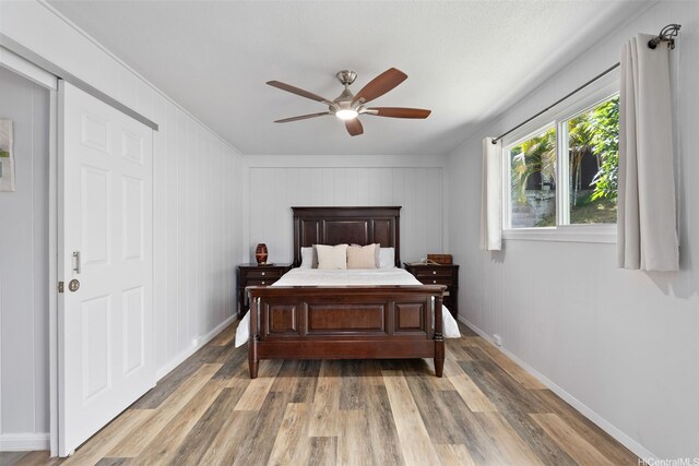 46-146 Hinalani Pl, Kaneohe, HI 96744 - bedroom with light wood-type flooring and a ceiling fan