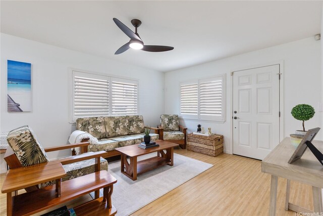 95-246 Wailawa St, Mililani, HI 96789 - living room with ceiling fan and light wood-type flooring