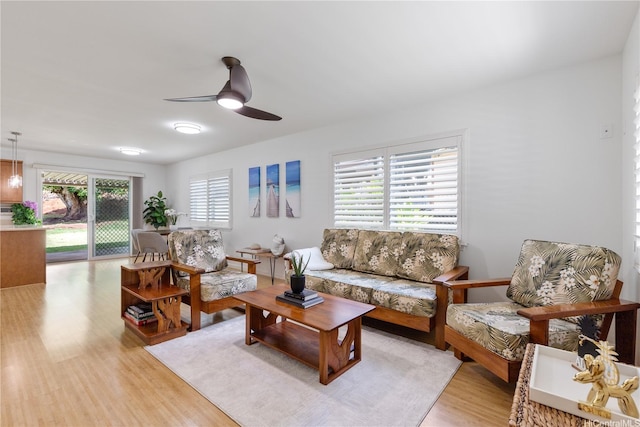 95-246 Wailawa St, Mililani, HI 96789 - living room featuring light wood-style floors and a ceiling fan