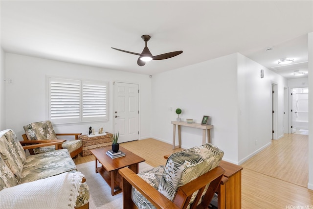 95-246 Wailawa St, Mililani, HI 96789 - living area with light wood-type flooring and a ceiling fan