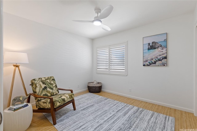 95-246 Wailawa St, Mililani, HI 96789 - living area with light wood-style flooring and a ceiling fan
