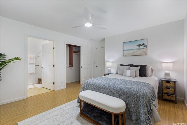 95-246 Wailawa St, Mililani, HI 96789 - bedroom with wood finished floors, ensuite bath, a ceiling fan, and a closet