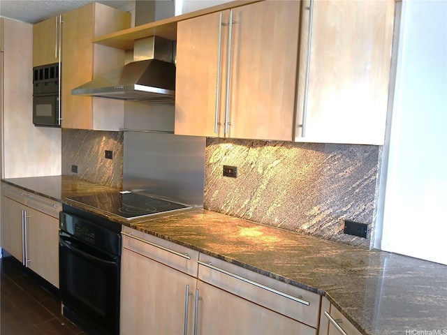 2092 Kuhio Ave Unit 805, Honolulu, HI 96815 - kitchen featuring black appliances, wall chimney range hood, open shelves, and dark stone countertops