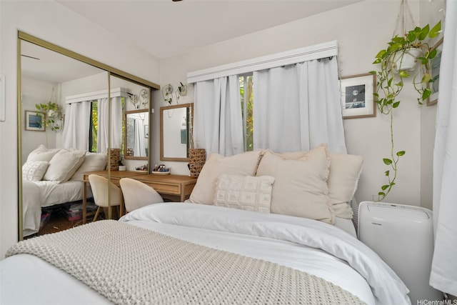 1607 Makiki St Unit B, Honolulu, HI 96822 - bedroom featuring multiple windows and a closet