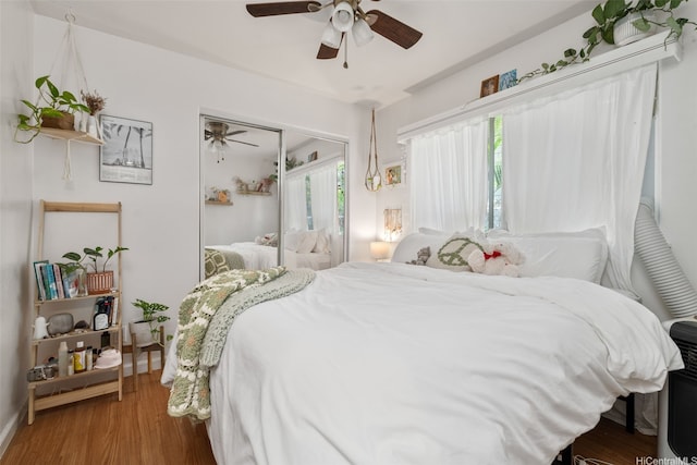 1607 Makiki St Unit B, Honolulu, HI 96822 - bedroom featuring wood finished floors, ceiling fan, and a closet