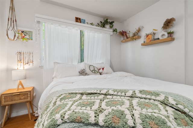 1607 Makiki St Unit B, Honolulu, HI 96822 - bedroom with wood finished floors and baseboards