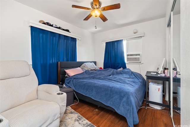 1607 Makiki St Unit B, Honolulu, HI 96822 - bedroom with wood finished floors, cooling unit, and a ceiling fan
