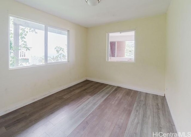73-4154 Kahauli Pl, Kailua Kona, HI 96740 - spare room featuring wood finished floors and baseboards