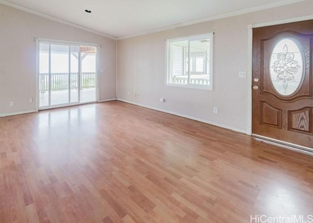 73-4154 Kahauli Pl, Kailua Kona, HI 96740 - foyer featuring ornamental molding, light wood-style floors, and vaulted ceiling
