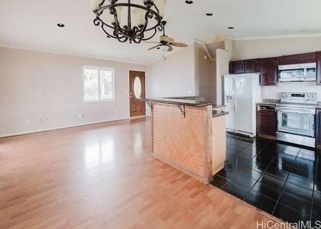 73-4154 Kahauli Pl, Kailua Kona, HI 96740 - kitchen with electric range, white refrigerator with ice dispenser, ornamental molding, a chandelier, and dark wood finished floors