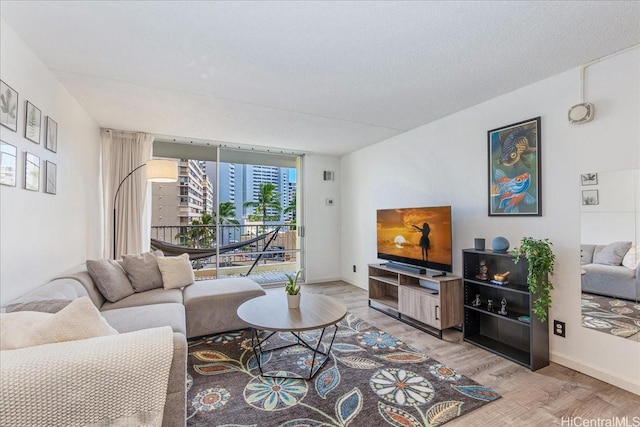 400 Hobron Ln Unit 603, Honolulu, HI 96815 - living area featuring light wood finished floors and baseboards