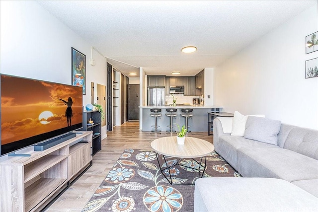 400 Hobron Ln Unit 603, Honolulu, HI 96815 - living room with light wood-type flooring and recessed lighting