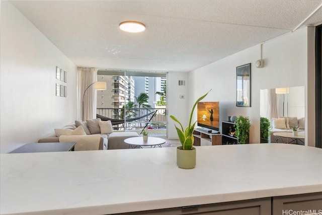 400 Hobron Ln Unit 603, Honolulu, HI 96815 - kitchen featuring open floor plan and light countertops