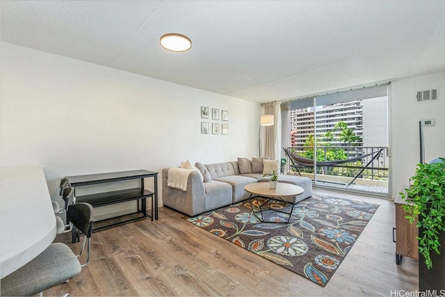400 Hobron Ln Unit 603, Honolulu, HI 96815 - living area featuring wood finished floors