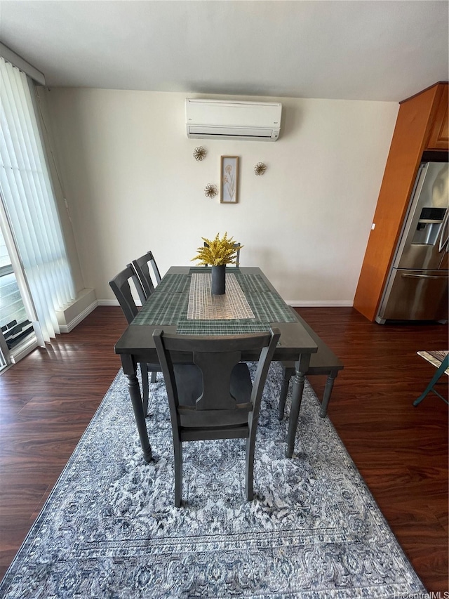 475 Atkinson Dr Unit 1909, Honolulu, HI 96814 - dining room featuring a wall unit AC and wood finished floors
