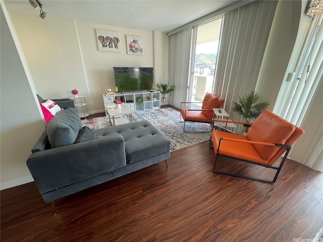 475 Atkinson Dr Unit 1909, Honolulu, HI 96814 - living area featuring wood finished floors and baseboards