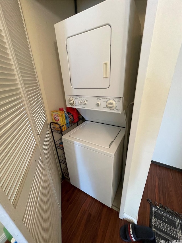 475 Atkinson Dr Unit 1909, Honolulu, HI 96814 - washroom with stacked washer / dryer and wood finished floors