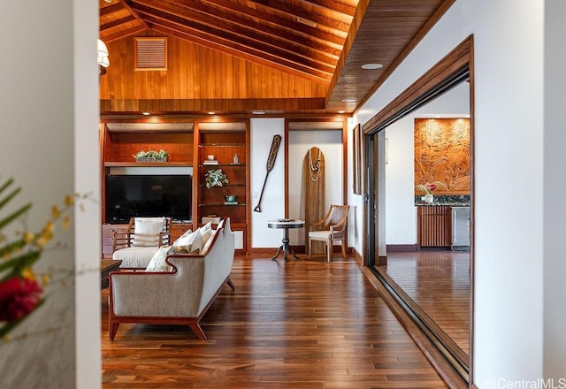 47 Kailuana Pl, Kailua, HI 96734 - living area with vaulted ceiling, wooden ceiling, wood-type flooring, and wooden walls