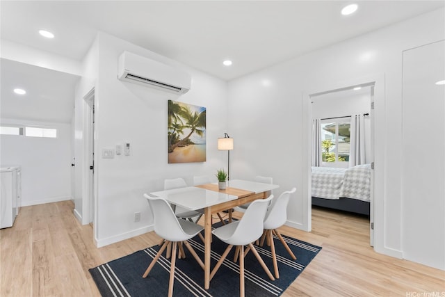 115A Makaweo St, Wahiawa, HI 96786 - dining space featuring a wall mounted AC, washing machine and dryer, plenty of natural light, light wood-type flooring, and recessed lighting