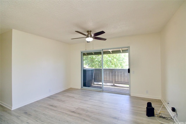 91-1180 Puamaeole St Unit 10T, Ewa Beach, HI 96706 - empty room with a ceiling fan, light wood-style flooring, and a textured ceiling