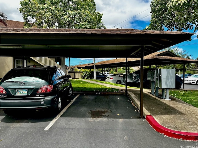 91-1180 Puamaeole St Unit 10T, Ewa Beach, HI 96706 - view of covered parking lot