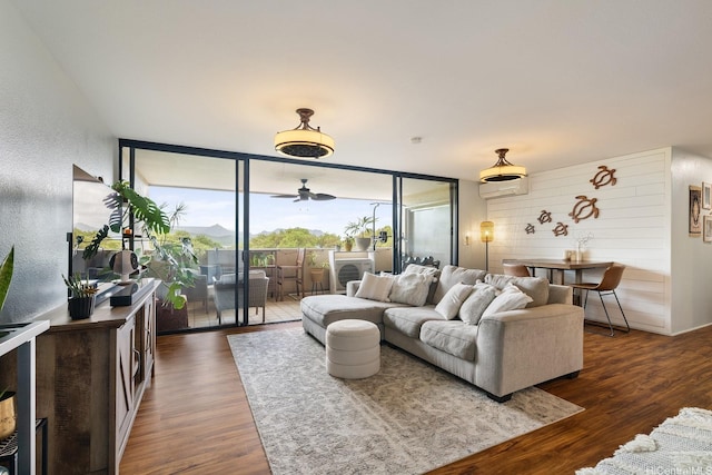 46-081 Konohiki St Unit 3533, Kaneohe, HI 96744 - living room with floor to ceiling windows, wood finished floors, and ceiling fan