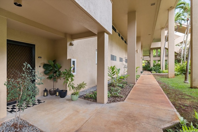 46-081 Konohiki St Unit 3533, Kaneohe, HI 96744 - doorway to property with stucco siding and a patio
