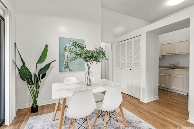 95-138 Kuahelani Ave Unit 244, Mililani, HI 96789 - dining area featuring light wood finished floors and baseboards