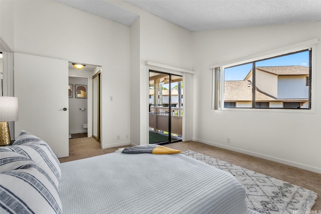 95-138 Kuahelani Ave Unit 244, Mililani, HI 96789 - bedroom featuring carpet floors, lofted ceiling, and access to exterior