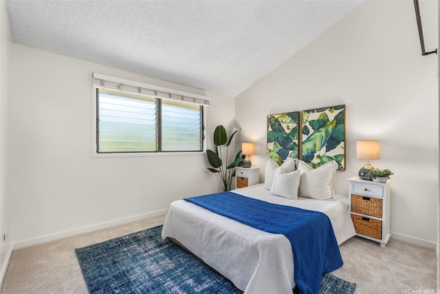 95-138 Kuahelani Ave Unit 244, Mililani, HI 96789 - carpeted bedroom featuring a textured ceiling and lofted ceiling