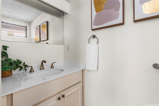 95-138 Kuahelani Ave Unit 244, Mililani, HI 96789 - bathroom with vanity and a textured ceiling