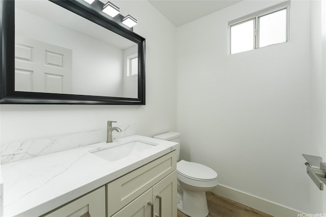94-615 Lumiaina St, Waipahu, HI 96797 - bathroom with vanity, wood finished floors, and healthy amount of natural light