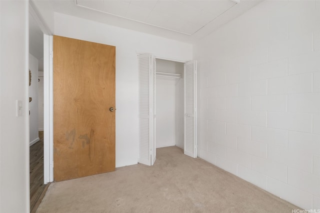3370 Salt Lake Blvd Unit 204, Honolulu, HI 96818 - unfurnished bedroom featuring a closet and carpet floors