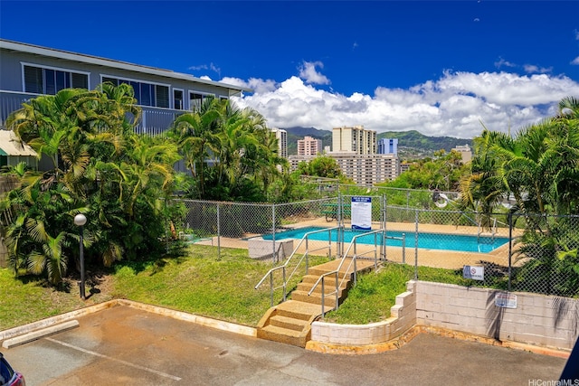 3370 Salt Lake Blvd Unit 204, Honolulu, HI 96818 - community pool featuring a patio