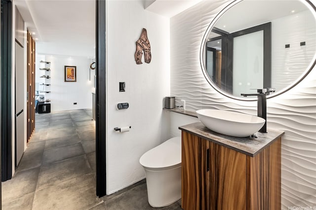 2987 Kalakaua Ave Unit 201, Honolulu, HI 96815 - bathroom with vanity and concrete flooring