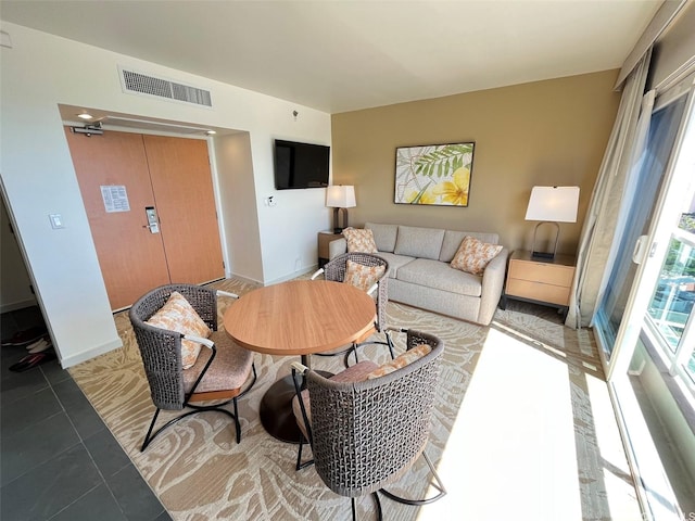 410 Atkinson Dr Unit 2007, Honolulu, HI 96814 - living room featuring tile patterned flooring and baseboards