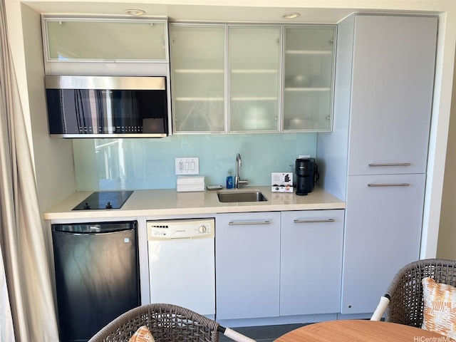 410 Atkinson Dr Unit 2007, Honolulu, HI 96814 - indoor wet bar with white dishwasher, stainless steel microwave, dishwashing machine, and black electric cooktop
