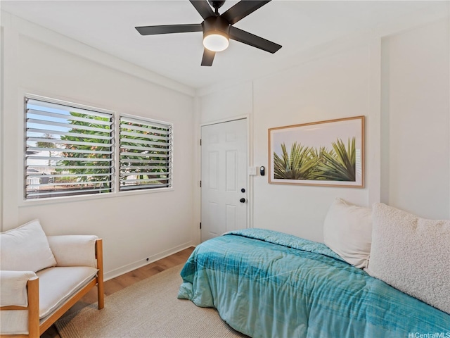 87-2204 Farrington Hwy Unit A, Waianae, HI 96792 - bedroom featuring wood finished floors and a ceiling fan