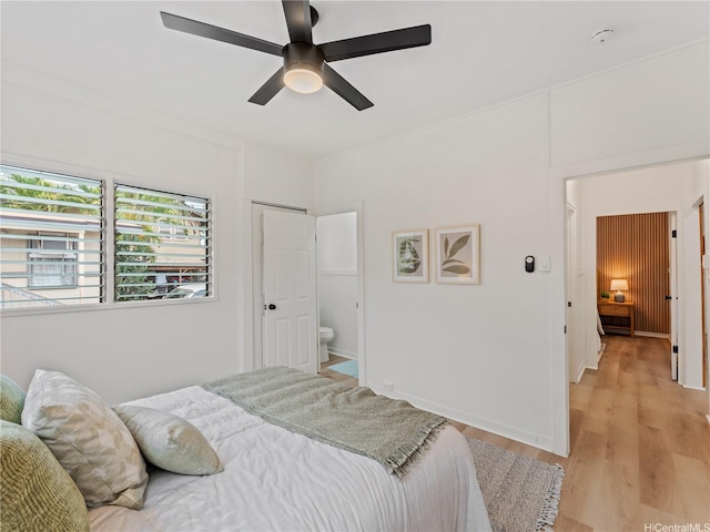 87-2204 Farrington Hwy Unit A, Waianae, HI 96792 - bedroom with light wood finished floors and ceiling fan