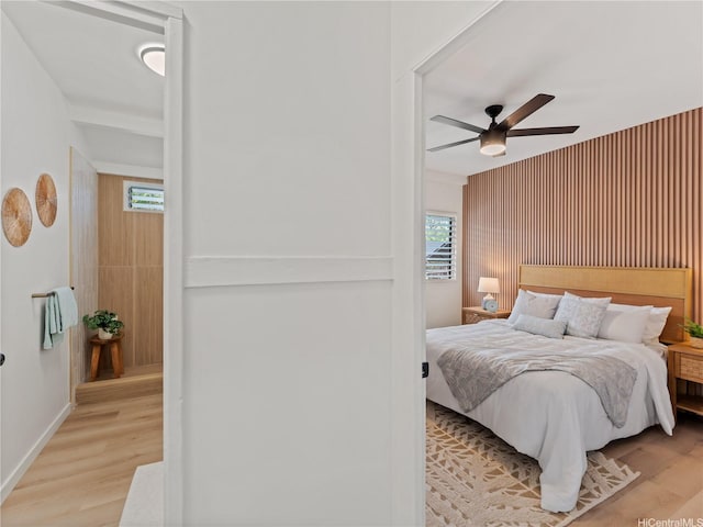 87-2204 Farrington Hwy Unit A, Waianae, HI 96792 - bedroom with light wood-style flooring and ceiling fan