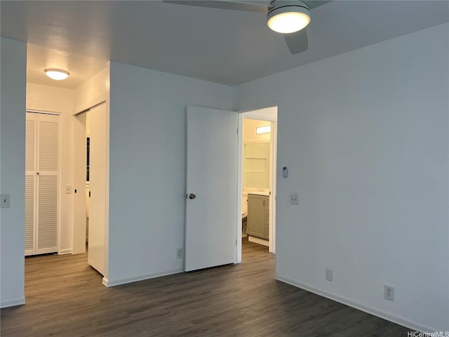 91-1089 Puamaeole St Unit 15D, Ewa Beach, HI 96706 - unfurnished bedroom featuring dark wood-style floors and a closet