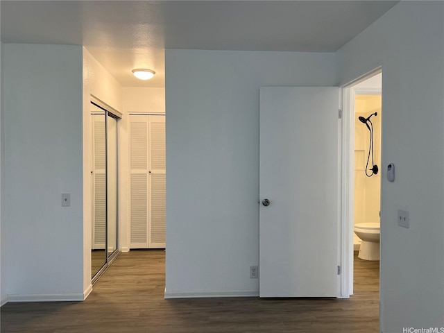 91-1089 Puamaeole St Unit 15D, Ewa Beach, HI 96706 - corridor featuring wood finished floors and baseboards