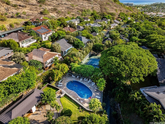 aerial view of residential area with a pool