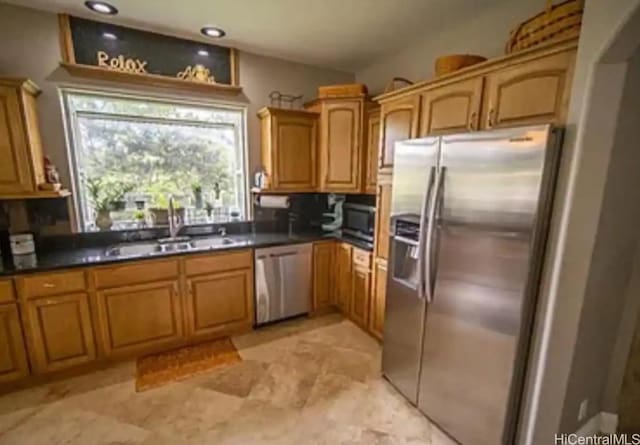 16-1873 34th Ave, Keaau, HI 96749 - kitchen featuring appliances with stainless steel finishes, dark countertops, recessed lighting, and brown cabinetry