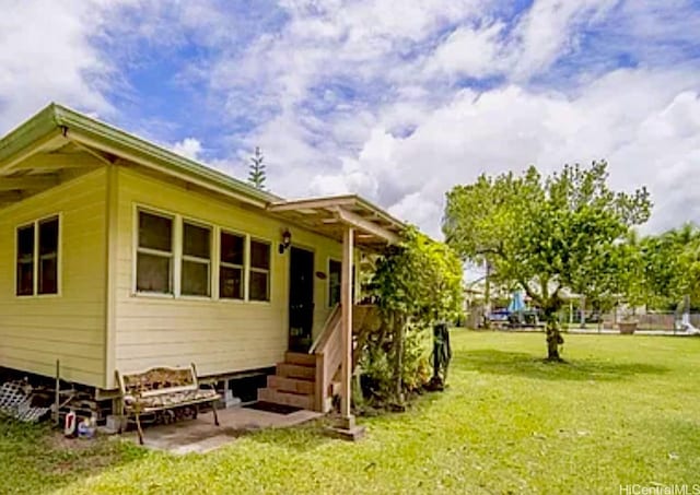 16-1873 34th Ave, Keaau, HI 96749 - back of property with a lawn