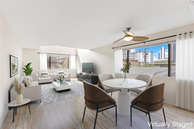 1418 Makiki St Unit A, Honolulu, HI 96814 - dining room featuring a ceiling fan and wood finished floors