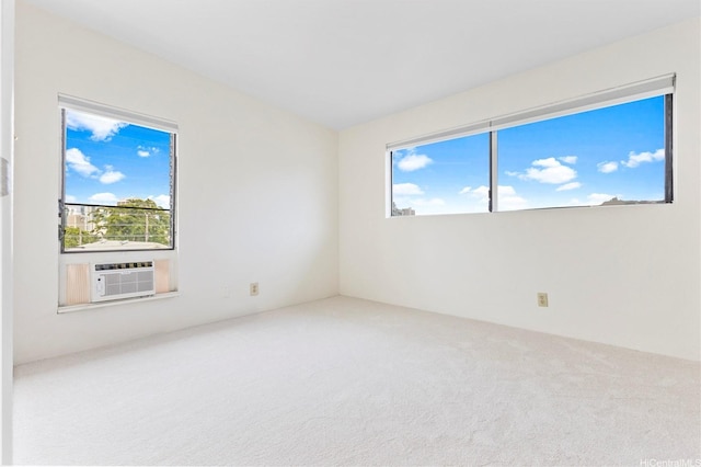 1418 Makiki St Unit A, Honolulu, HI 96814 - carpeted spare room with cooling unit and plenty of natural light