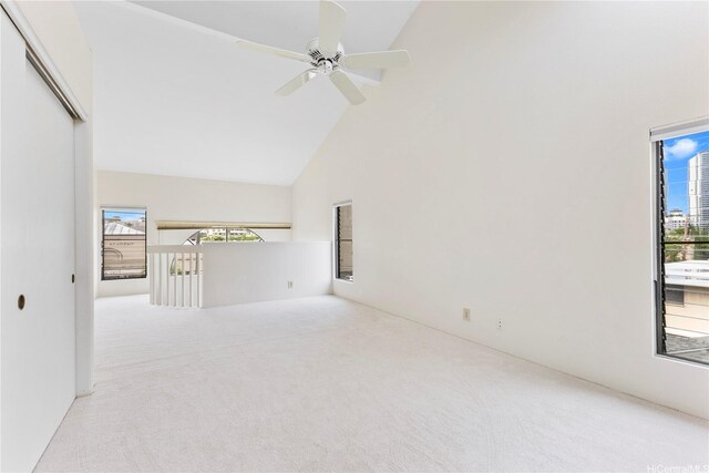 1418 Makiki St Unit A, Honolulu, HI 96814 - carpeted empty room featuring high vaulted ceiling and a ceiling fan