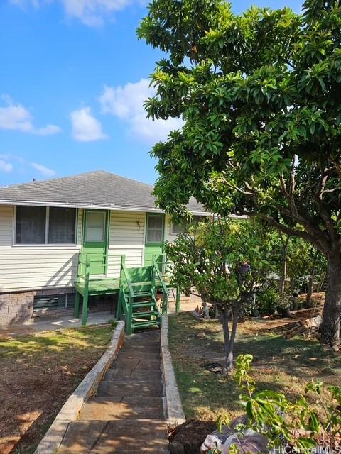 3844 Likini St, Honolulu, HI 96818 - view of front of home with a shingled roof
